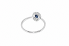 A sapphire & diamond cluster ring rear view