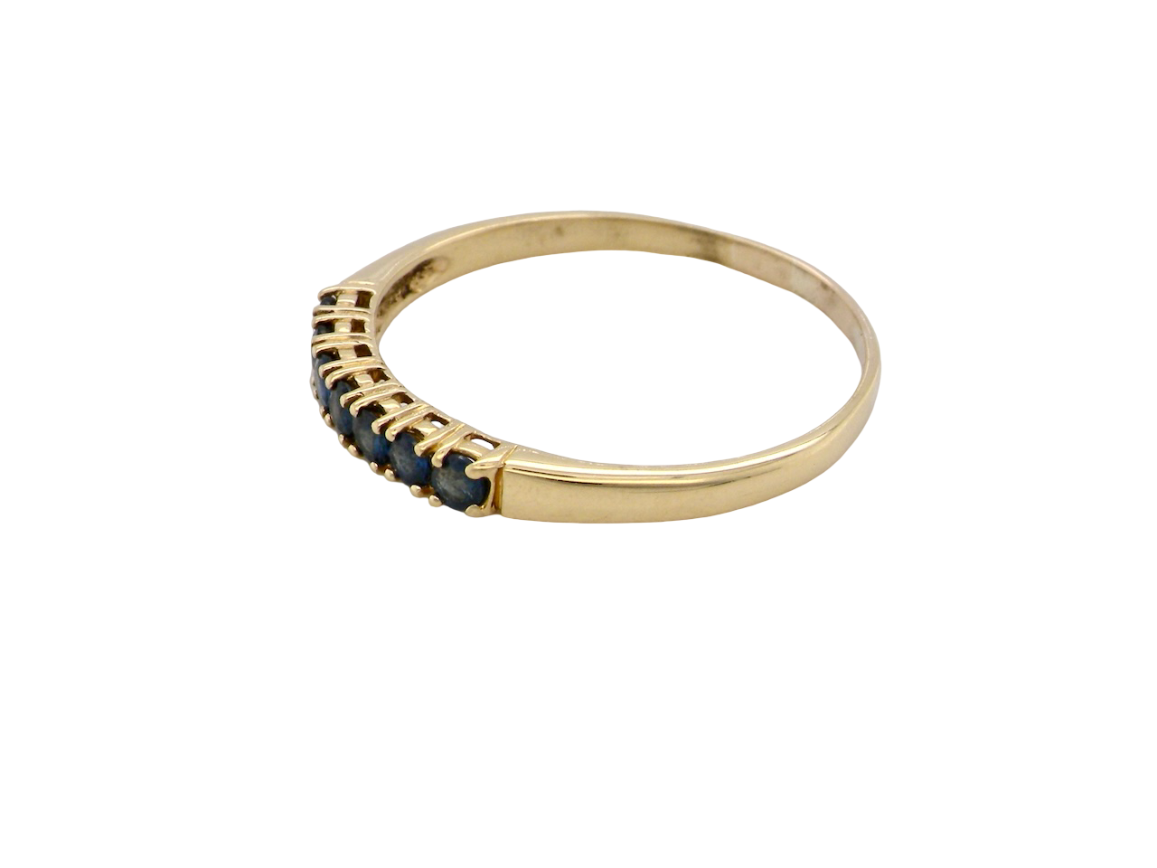 A sapphire half hoop eternity ring 
