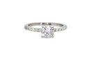 A stunning 14-carat white gold* solitaire ring featuring a brilliant-cut white diamond.