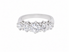 A stunning half hoop ring featuring five exceptional brilliant-cut white diamonds, expertly claw set in 18ct white gold.

