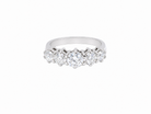 A stunning half hoop ring featuring five exceptional brilliant-cut white diamonds, expertly claw set in 18ct white gold.

The centre diamond measures approximately 5.8mm (estimated 0.70 carats), flanked by a 5.0mm diamond on each side, with 4.5mm diamonds at each end. 