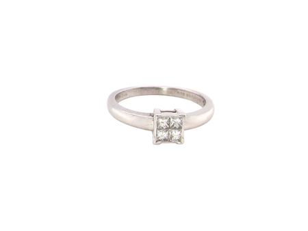 A white gold diamond cluster ring