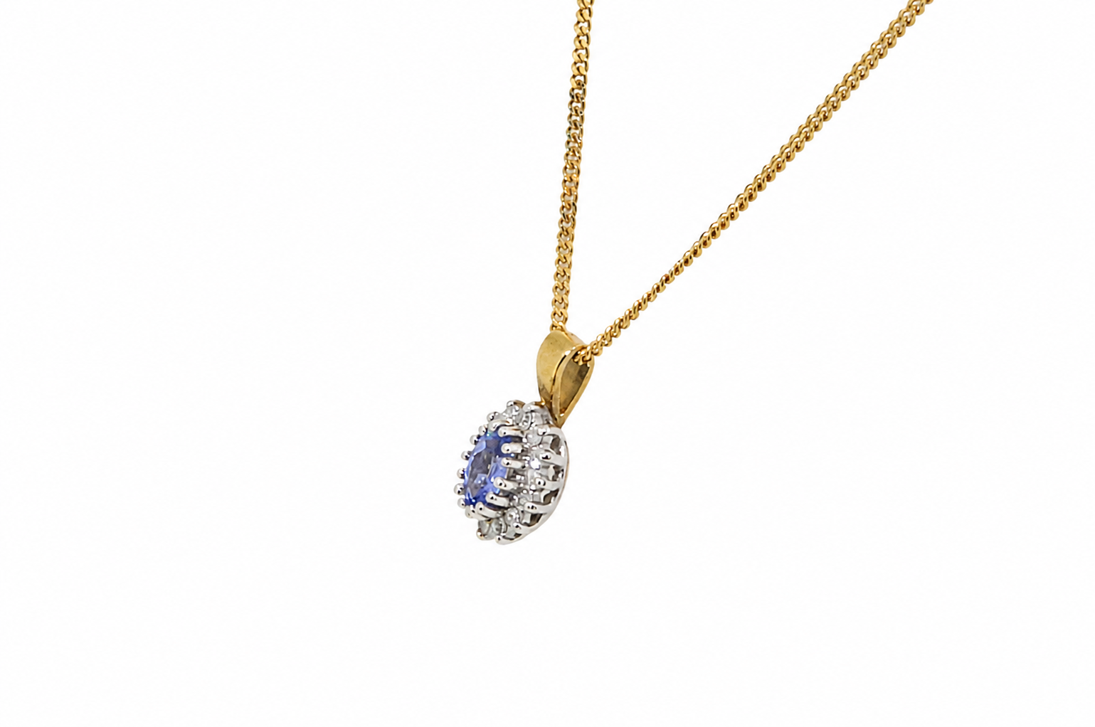 Side view of tanzanite and diamond pendant 
