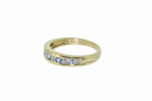 Side view of tanzanite and diamond eternity ring
