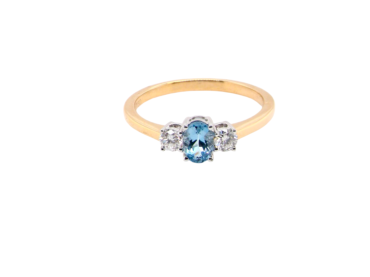 A three stone Aquamarine and Diamond ring