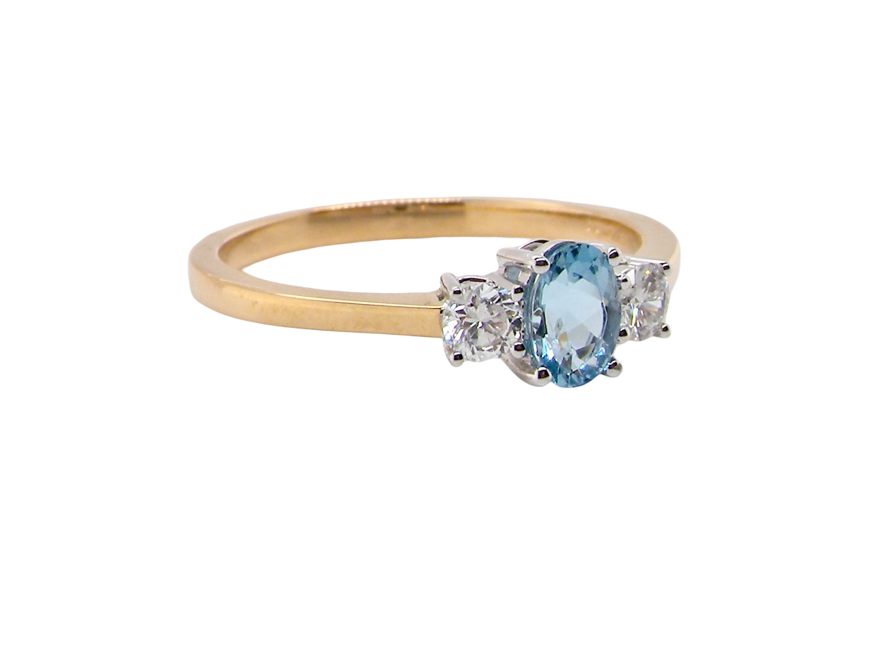 A three stone Aquamarine and Diamond ring