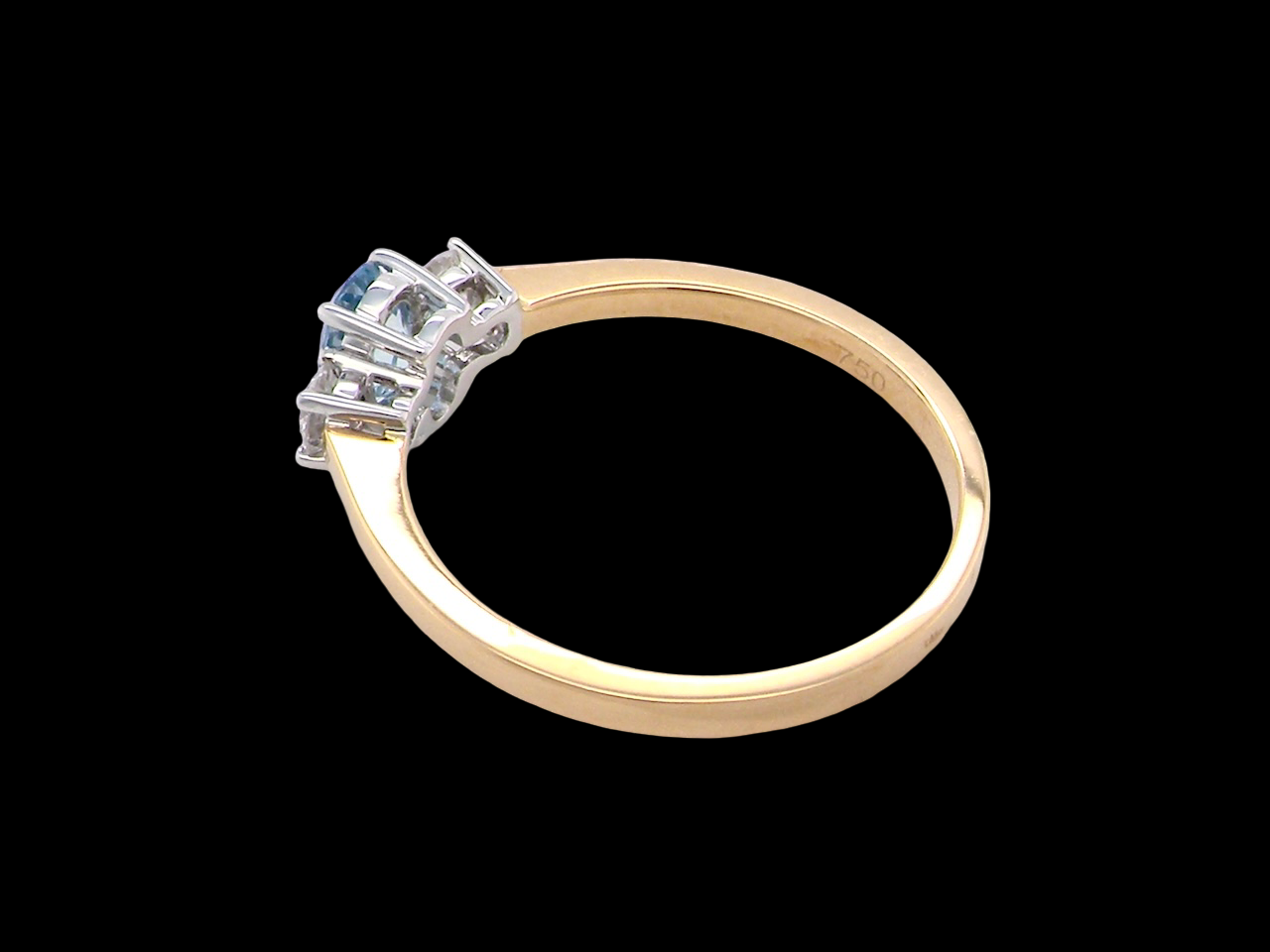 A three stone Aquamarine and Diamond ring