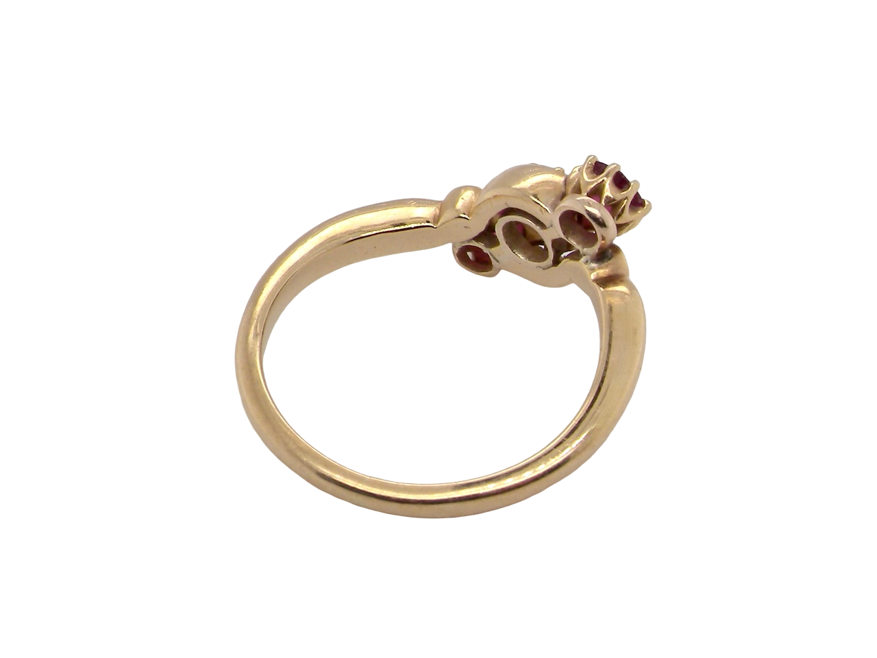 A three stone Ruby and Diamond cross over Ring