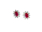A timeless and elegant pair of ruby and diamond cluster earrings.