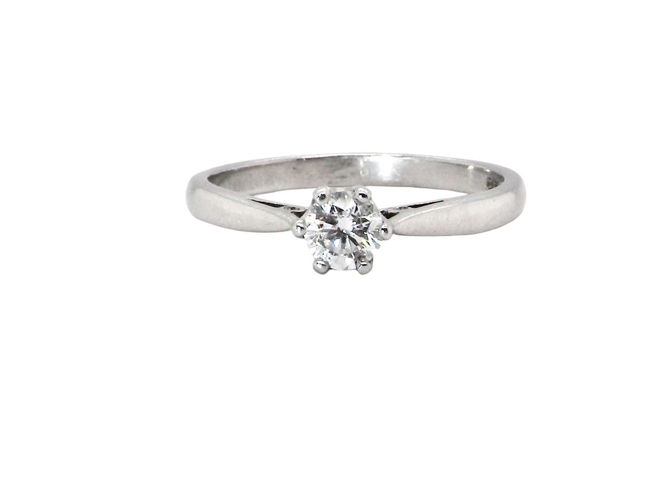 A timeless and elegant solitaire ring set with a brilliant-cut white diamond