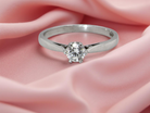 A timeless and elegant solitaire ring set with a white diamond