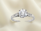 A timeless vintage solitaire ring set with a striking old brilliant cut white diamond. The central diamond measures approximately 6mm, estimated at 0.75 carat, with colour graded between G–I and 