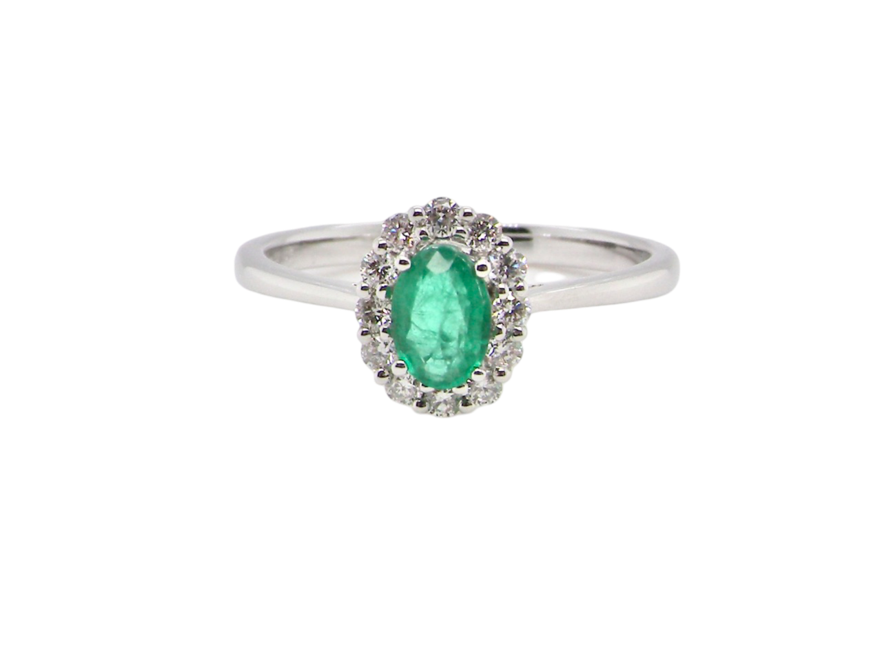 A traditional Emerald & Diamond cluster ring