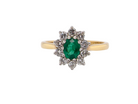 A traditional Emerald and Diamond cluster ring