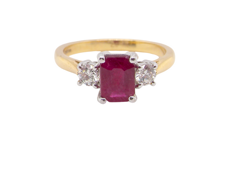 A traditional Ruby and Diamond three stone ring