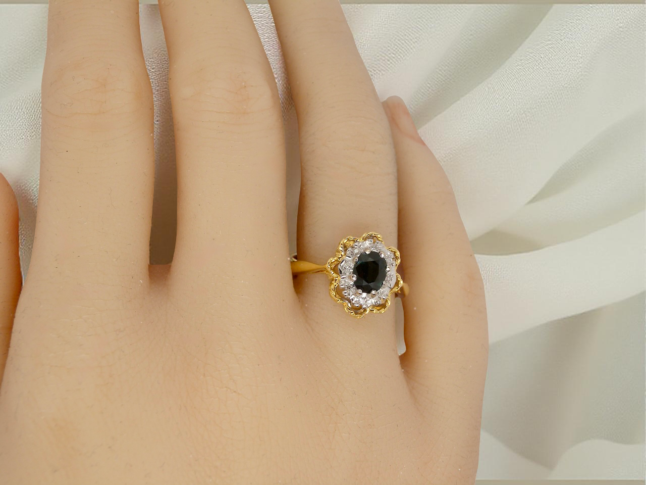 A traditional Sapphire and Diamond cluster ring