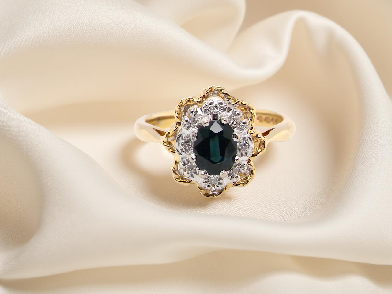 A traditional Sapphire and Diamond cluster ring