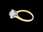 A traditional cluster ring. Features to the centre a 3.4mm brilliant cut white diamond (est 0.15 carats)

Surrounded by six 3.4mm diamonds to match side