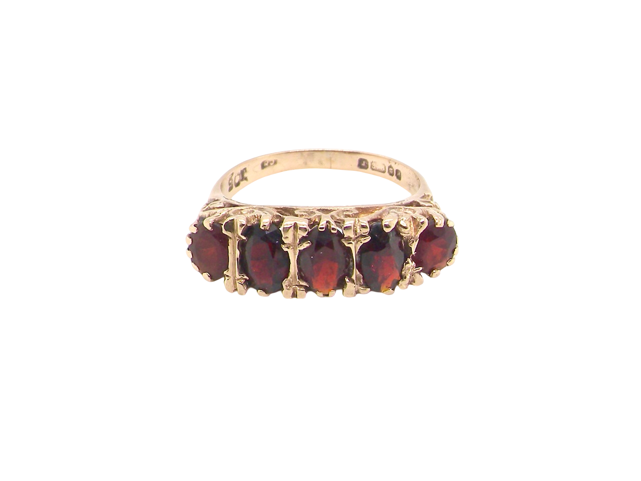 A traditional garnet dress ring