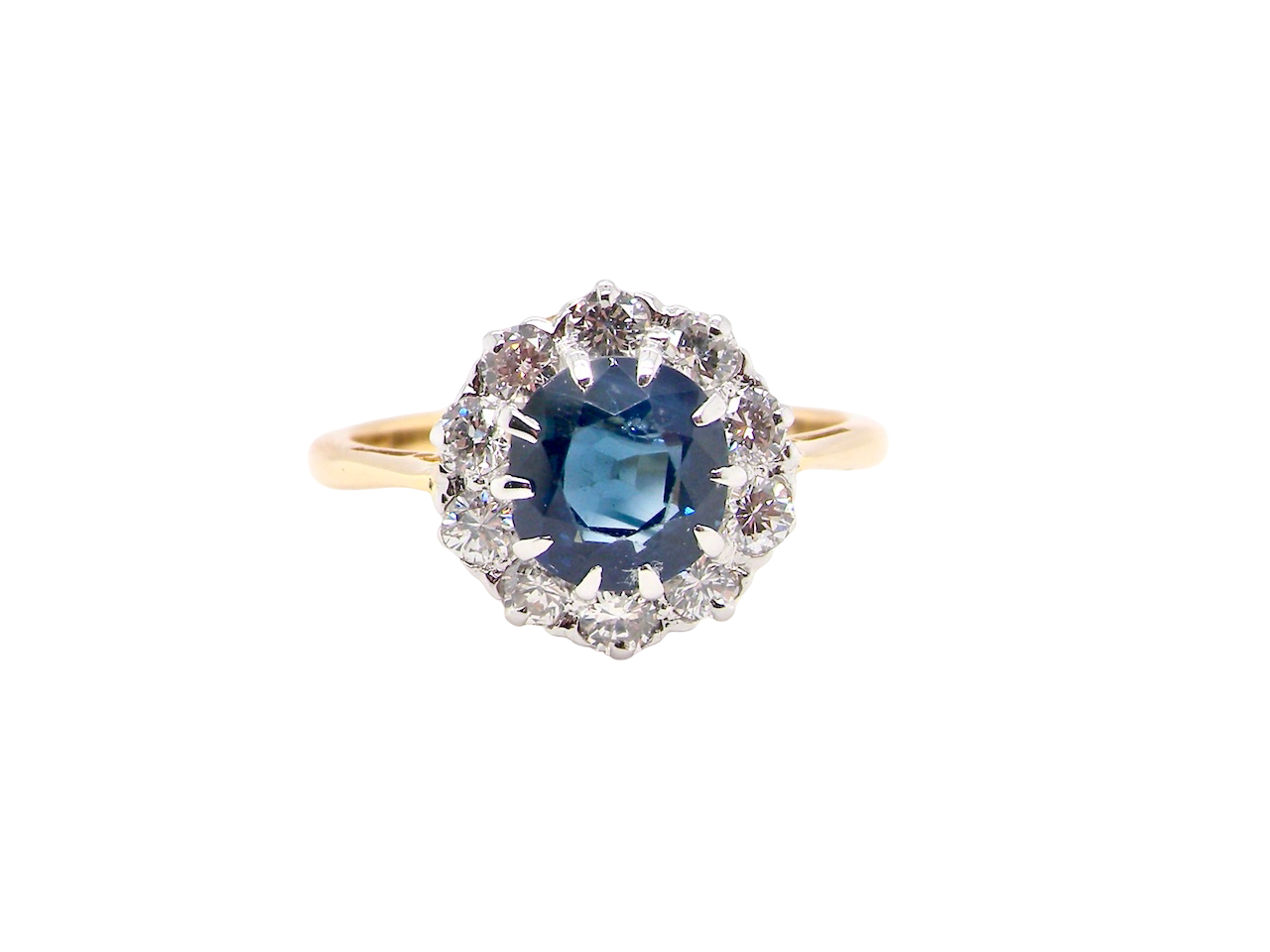 A traditional round cluster- Sapphire and Diamond