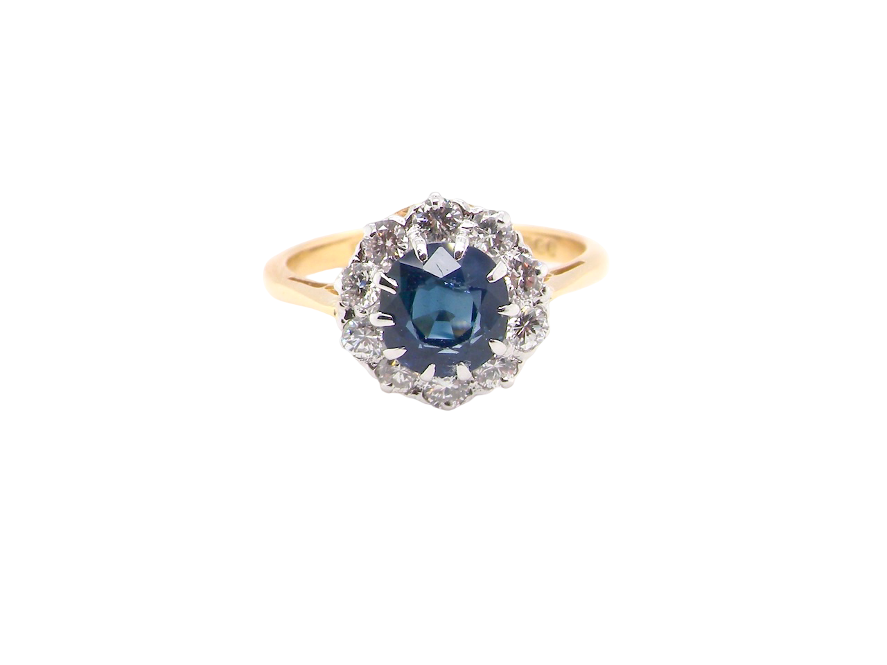 A traditional round cluster- Sapphire and Diamond
