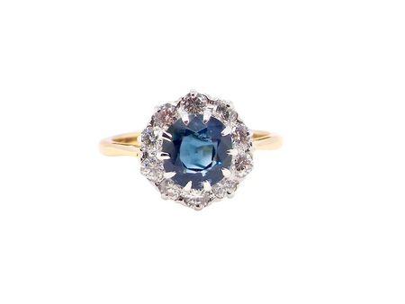 A traditional round cluster- Sapphire and Diamond
