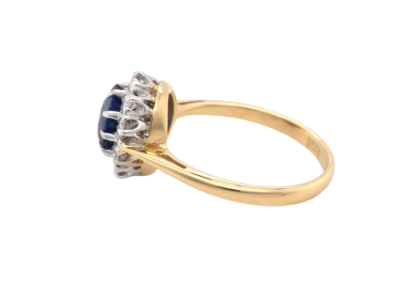 A traditional round cluster- Sapphire and Diamond