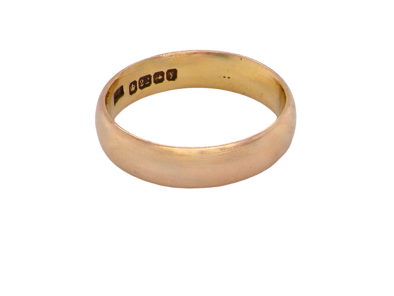 A traditional wedding ring. 22 carat gold (almost pure gold), D shape profile.

Width 4.7mm. 