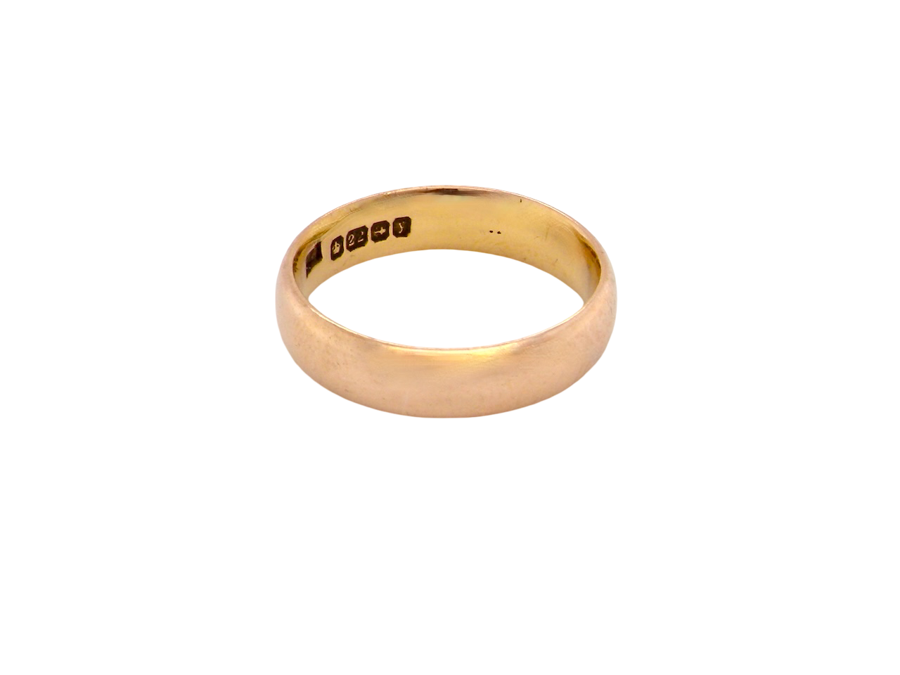 A traditional wedding ring. 22 carat gold (almost pure gold), D shape profile.

Width 4.7mm. Plain polished finish.