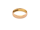 A traditional wedding ring. 22 carat gold (almost pure gold), D shape profile.

Width 4.7mm. Plain polished finish.