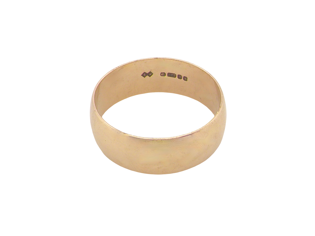 A traditional wedding ring. 9 carat gold and suitable as a ring for a man. Width 7.5mm, D shape profile.