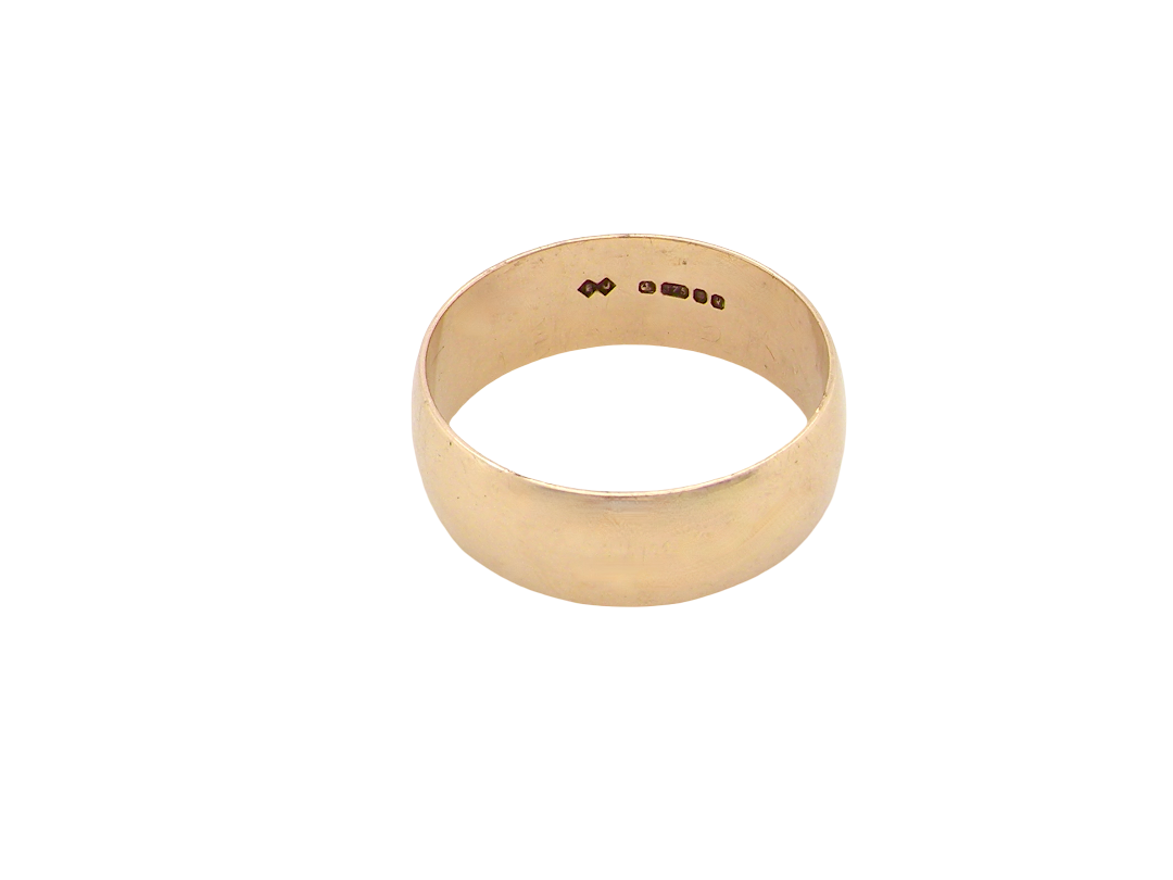 A traditional wedding ring. 9 carat gold and suitable as a ring for a man. Width 7.5mm, D shape profile.

