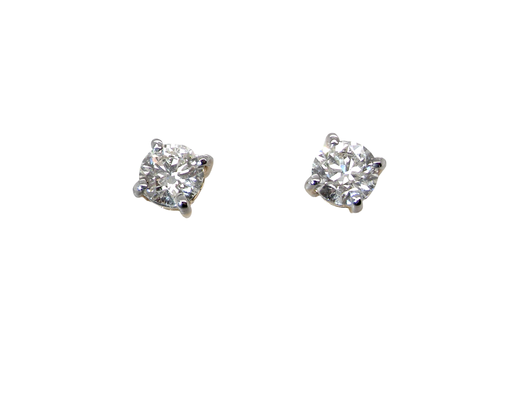 A truly gorgeous pair of classic diamond stud earrings. Simple, elegant and effortlessly wearable, this timeless design is perfect for both day and evening wear 