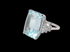 A truly spectacular vintage statement ring, centred with an impressive rectangular-cut aquamarine of exceptional proportions.