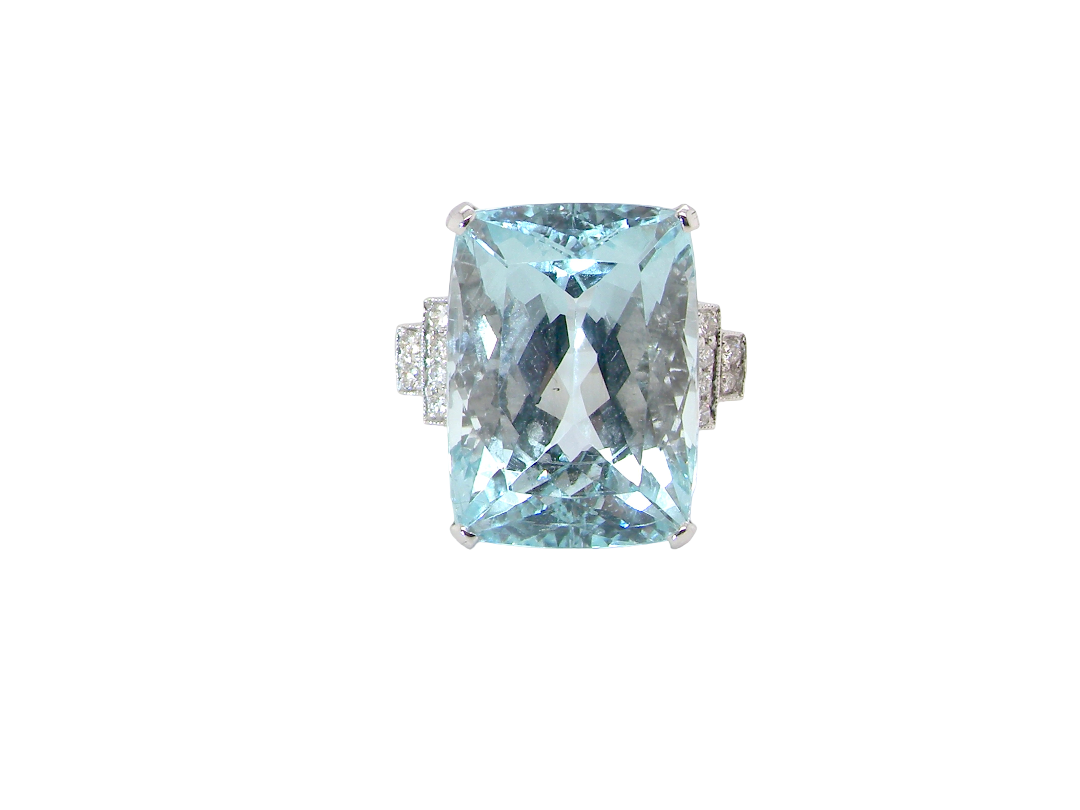 A truly spectacular vintage statement ring, centred with an impressive rectangular-cut aquamarine of exceptional proportions. Measuring approximately&nbsp;18 x 13mm with a depth of 11mm, the aquamarine is estimated to weigh around 18 carats 