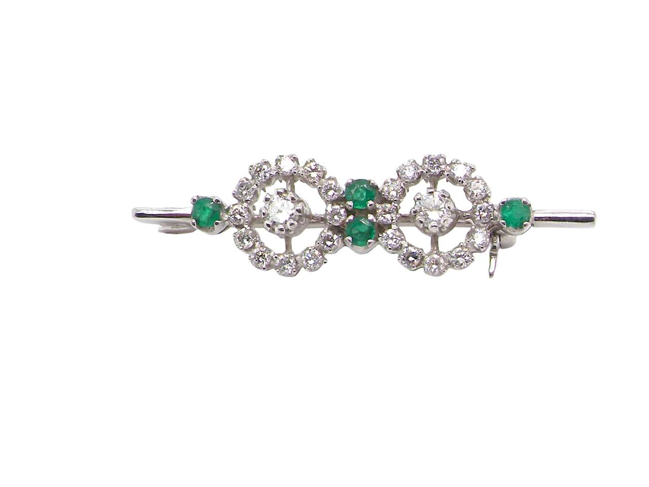 A very pretty and wearable brooch. A double cluster of brilliant cut white diamonds, each set to the centre with an 0.10 carat stone and surrounded by twelve x 0.015 carat stones*. &nbsp;Total carat weight estimated at 0.60 carats*