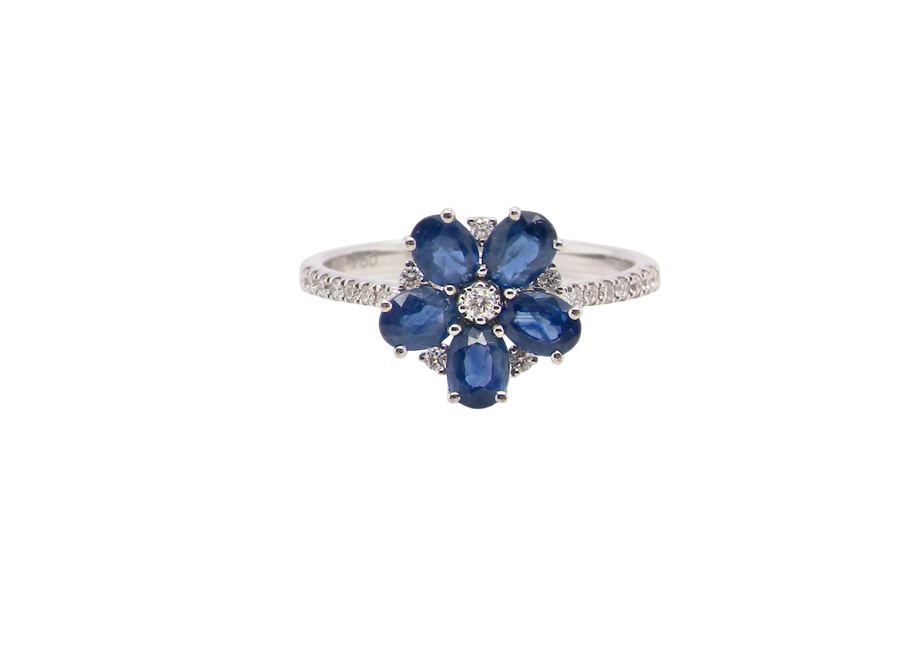 A very pretty cluster ring. Features six cornflower blue oval cut sapphires