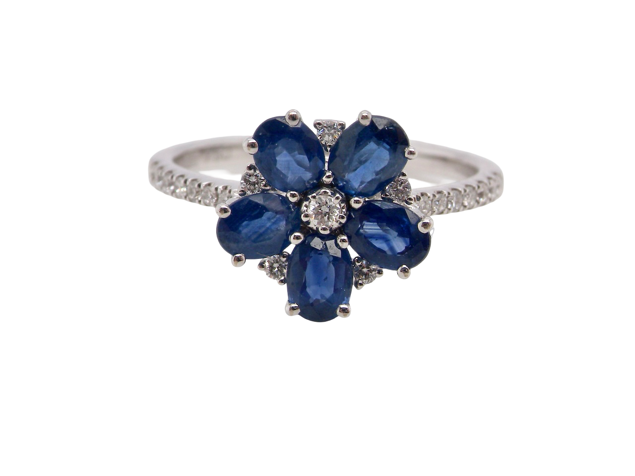 A very pretty cluster ring. Features six sapphires