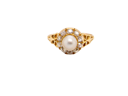 A very pretty cluster ring set with a central cultured pearl
