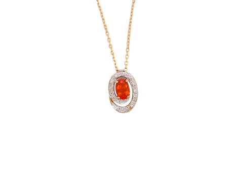 A very pretty pendant set with a fireglow orange Fire Opal.&nbsp; Measures 6x4mm (0.50 carats).
