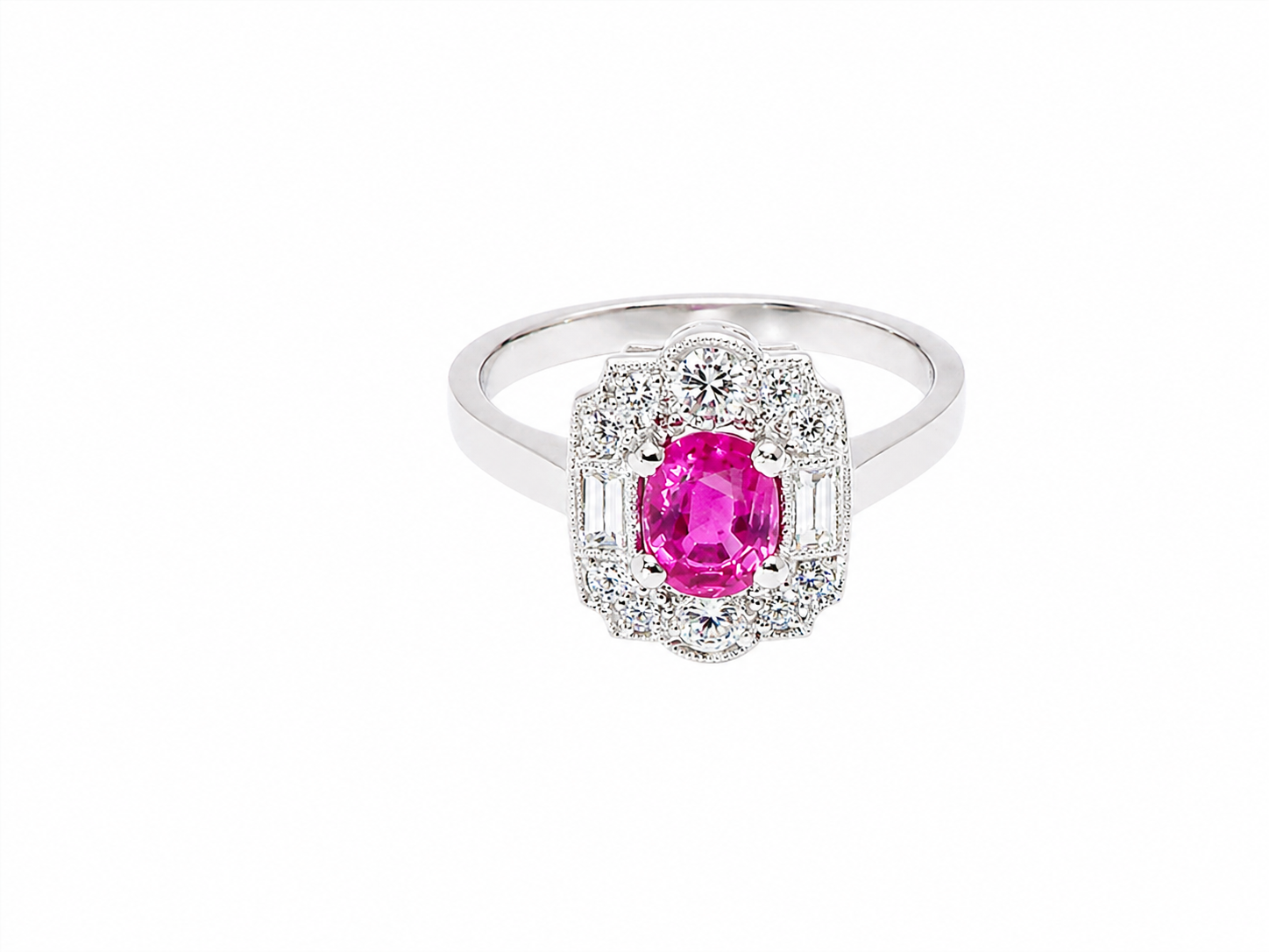 A very pretty ring that features an oval cut pink sapphire, 6x4mm (est 0.50 carats).&nbsp;