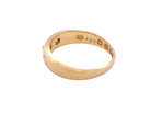 A vintage 18 carat gold three stone ring. Set with brilliant cut white diamonds, cente 3mm, each side a 2.4mm diamond (total est 0.20 carats) Colour I-j, clarity Si.&nbsp;
 side