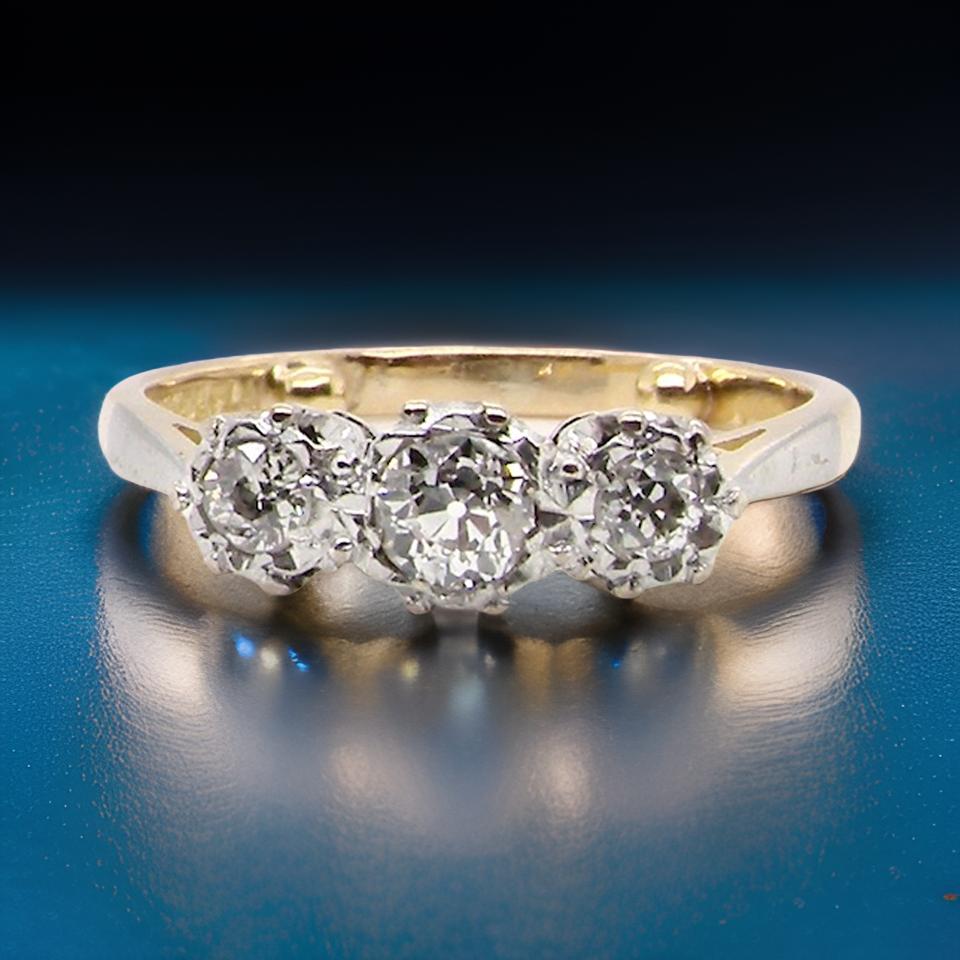 A vintage three stone Diamond Ring Vintage Tom Antique Jewellery