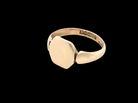 A vintage 9 carat gold signet ring. Six sided head shape,