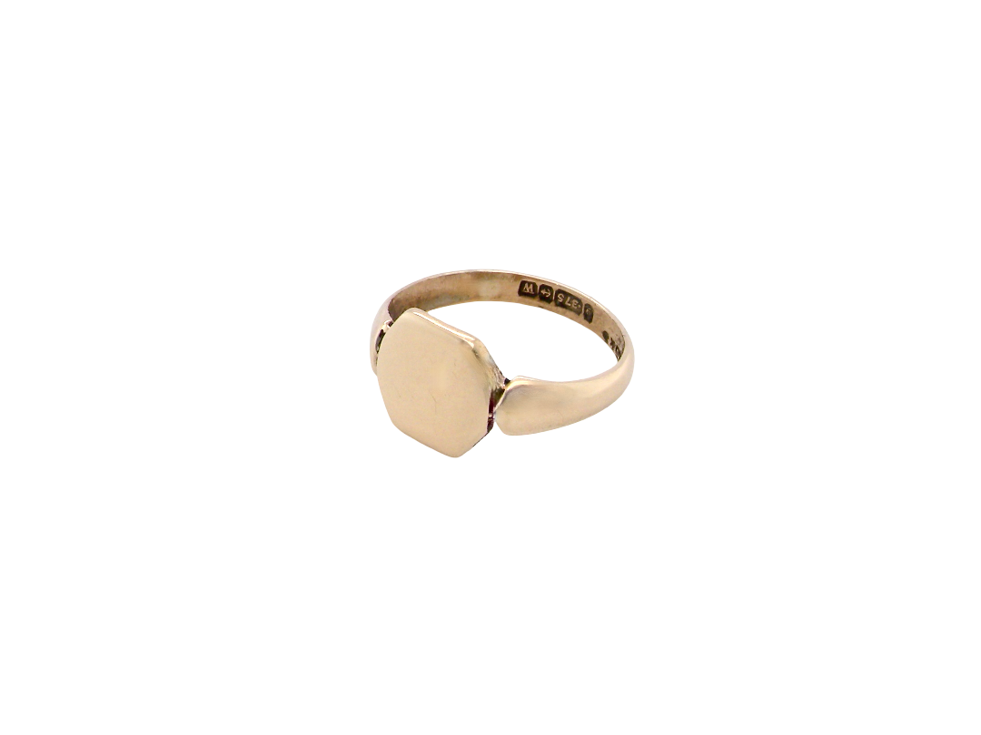 A vintage 9 carat gold signet ring. Six sided shape,