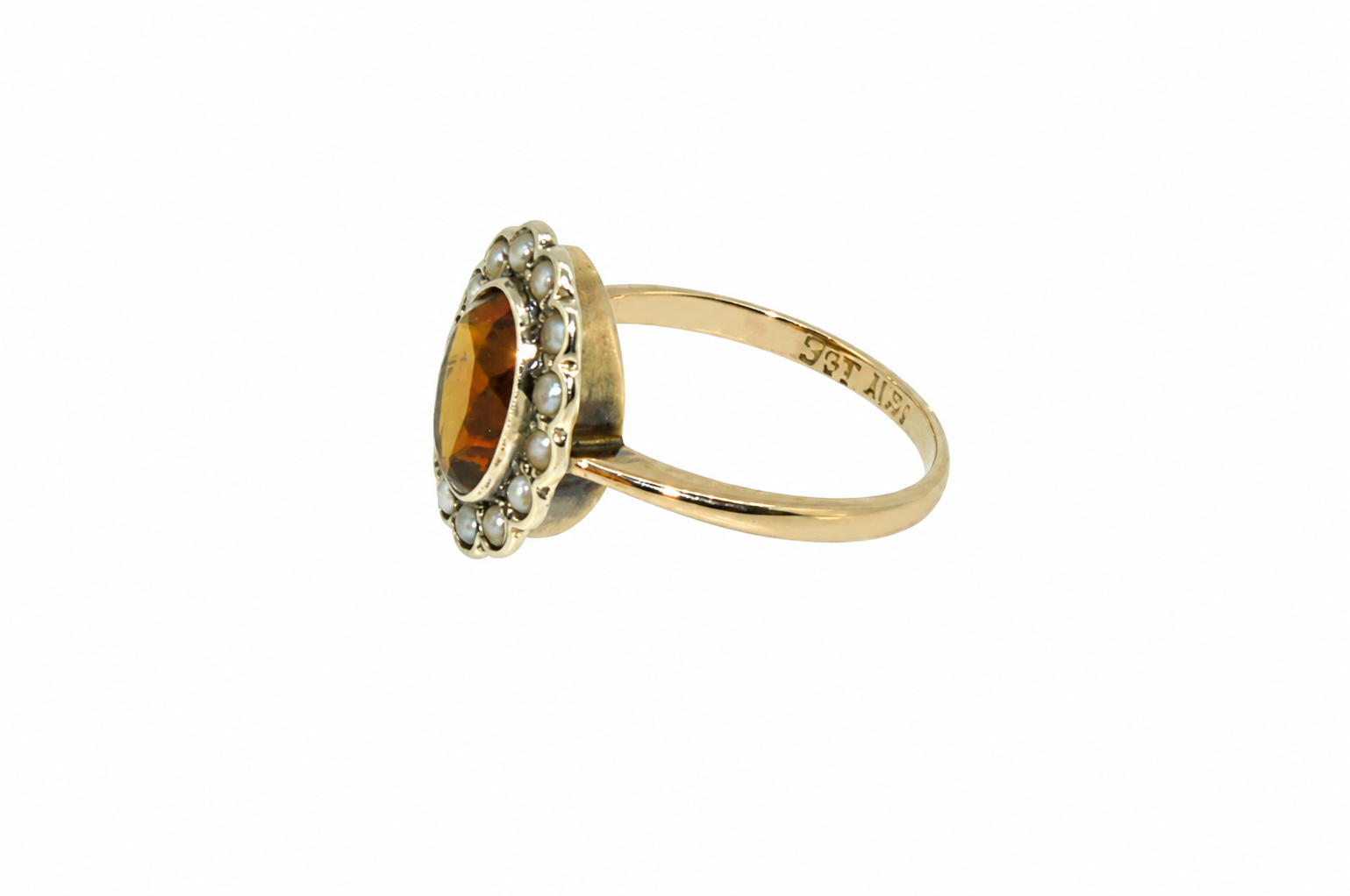 A vintage citrine and diamond ring side view