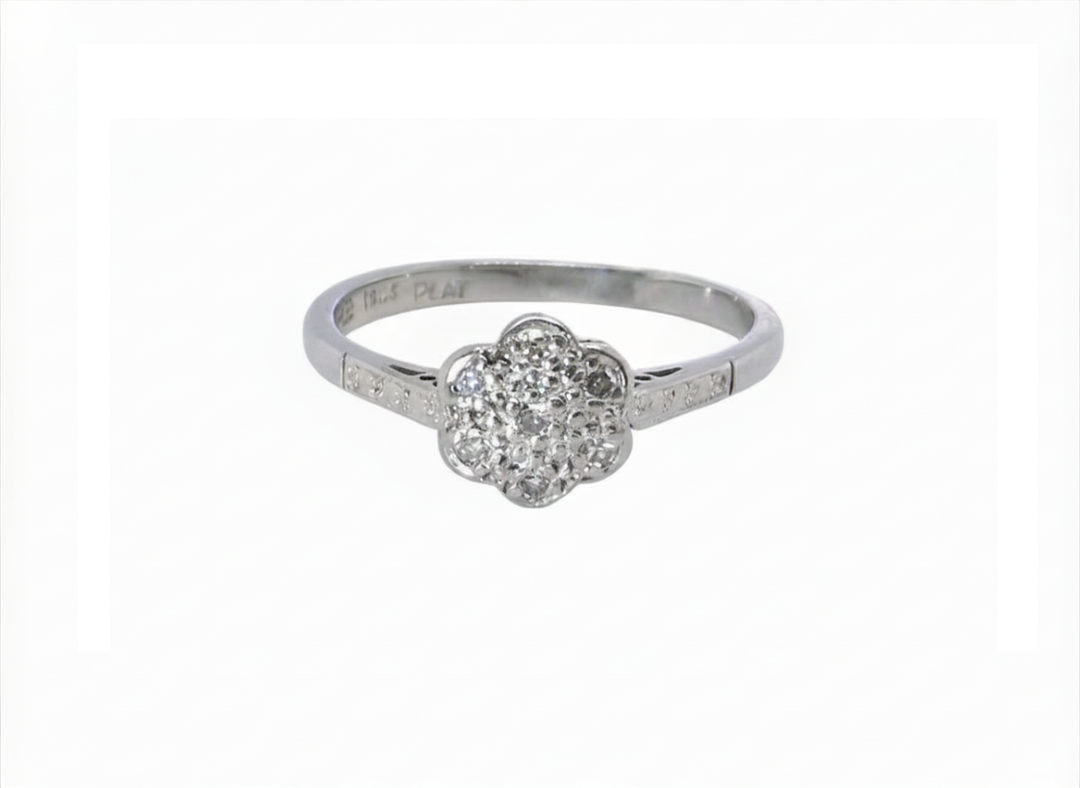 A vintage white gold diamond cluster ring