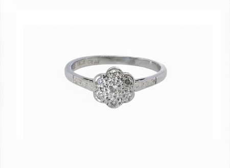 A vintage white gold diamond cluster ring