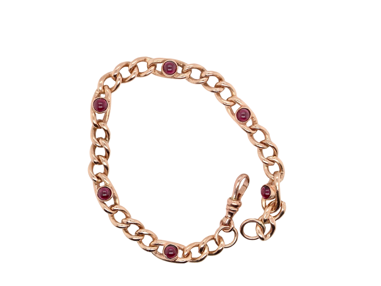 A vintage curb bracelet set with garnets