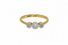 A vintage diamond illusion set trilogy ring